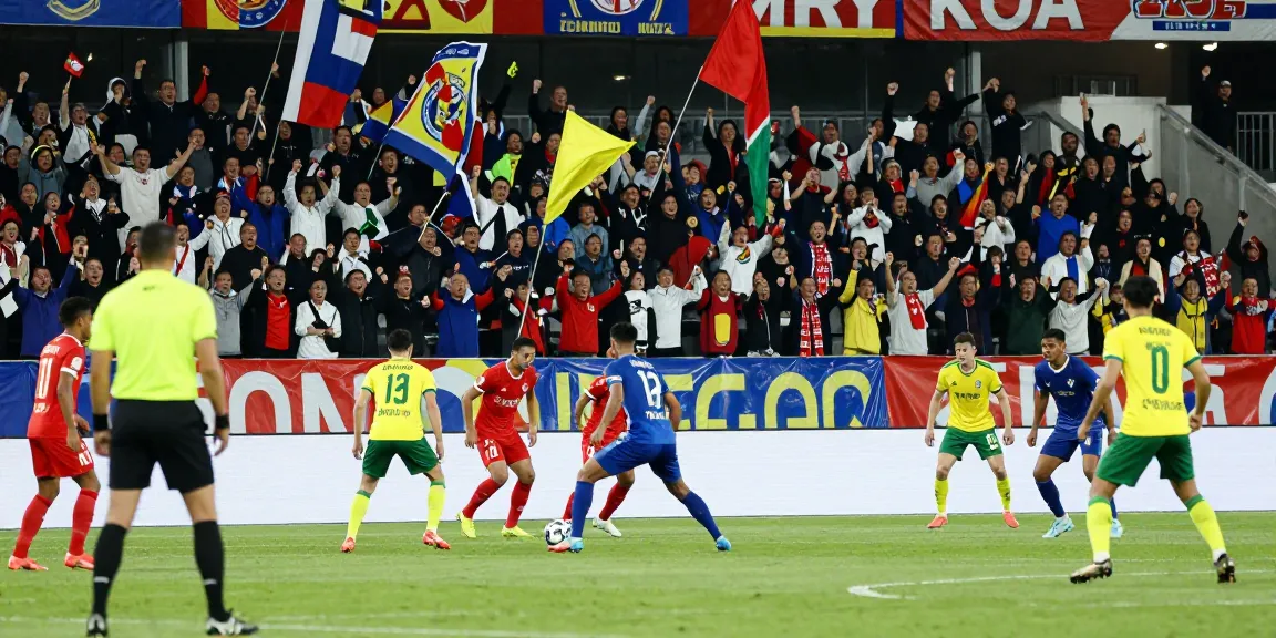 Exciting moment from a kora live football match with players and cheering fans.